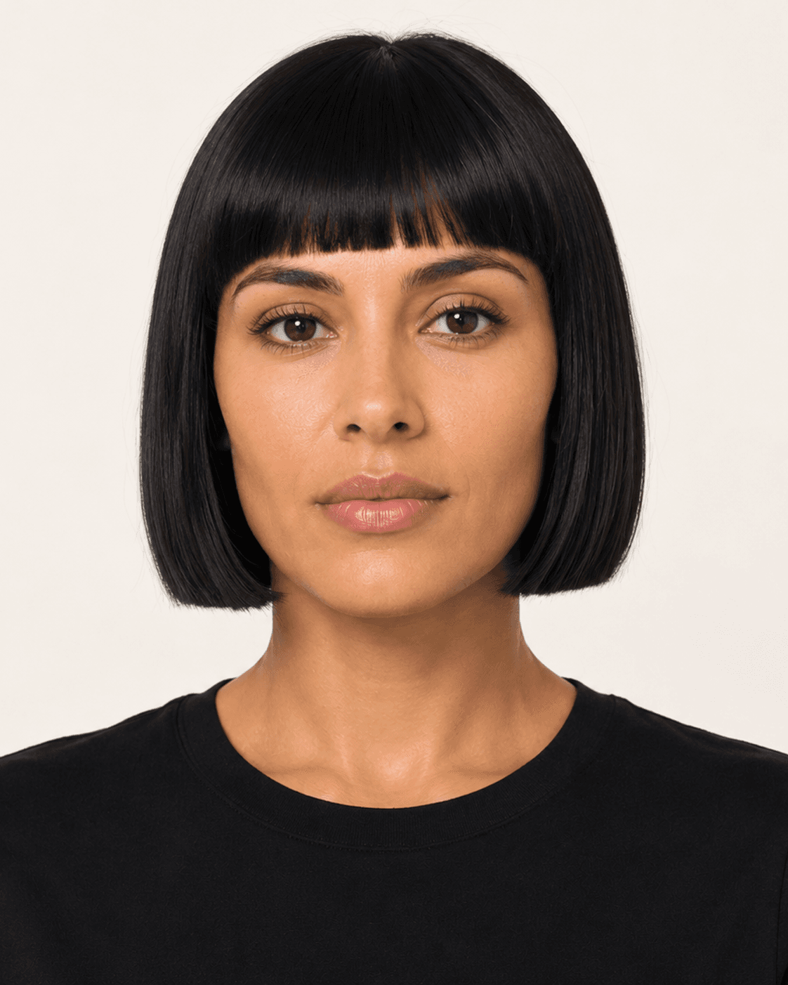 Front view of a compact blunt-looking bob with short fringe