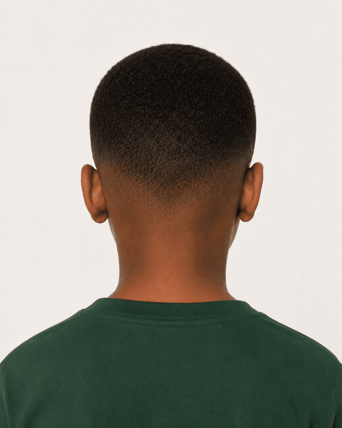 Rear view of a buzz cut showing the uniform length and neckline