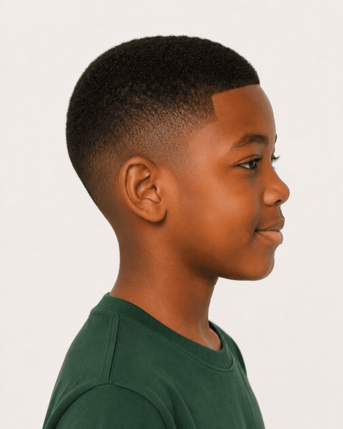 Side profile of a buzz cut showing the line up and temple taper