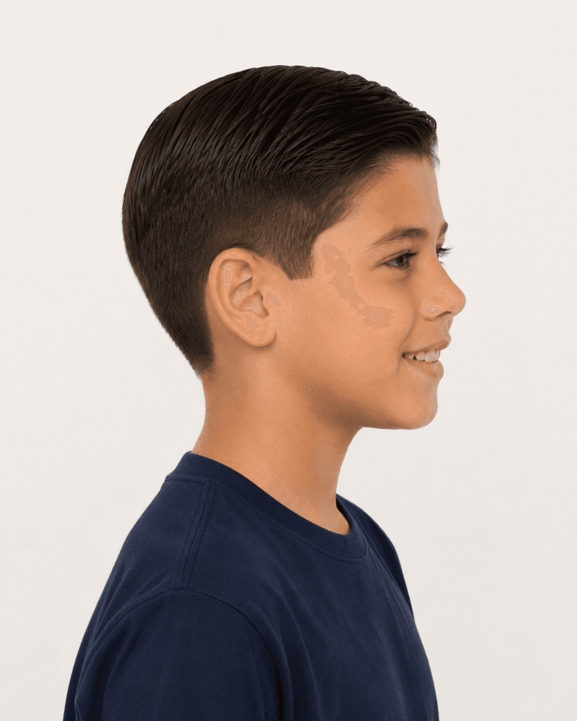 Side profile of a classic side part showing the taper and ear contour