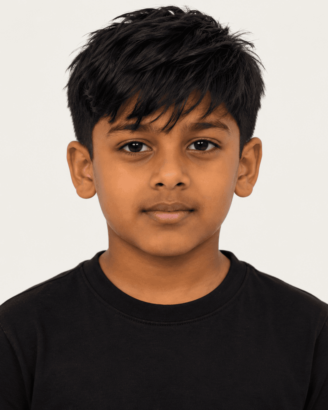 Front view of a child-safe textured fringe reference with broken forehead-skimming points and a fuller irregular top