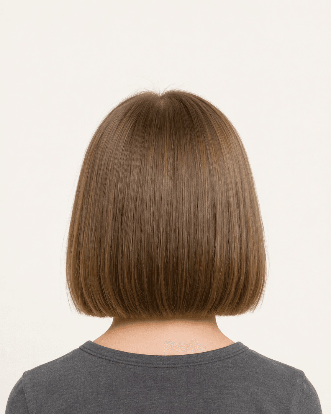 Rear view of a short bob with soft bangs showing the perimeter