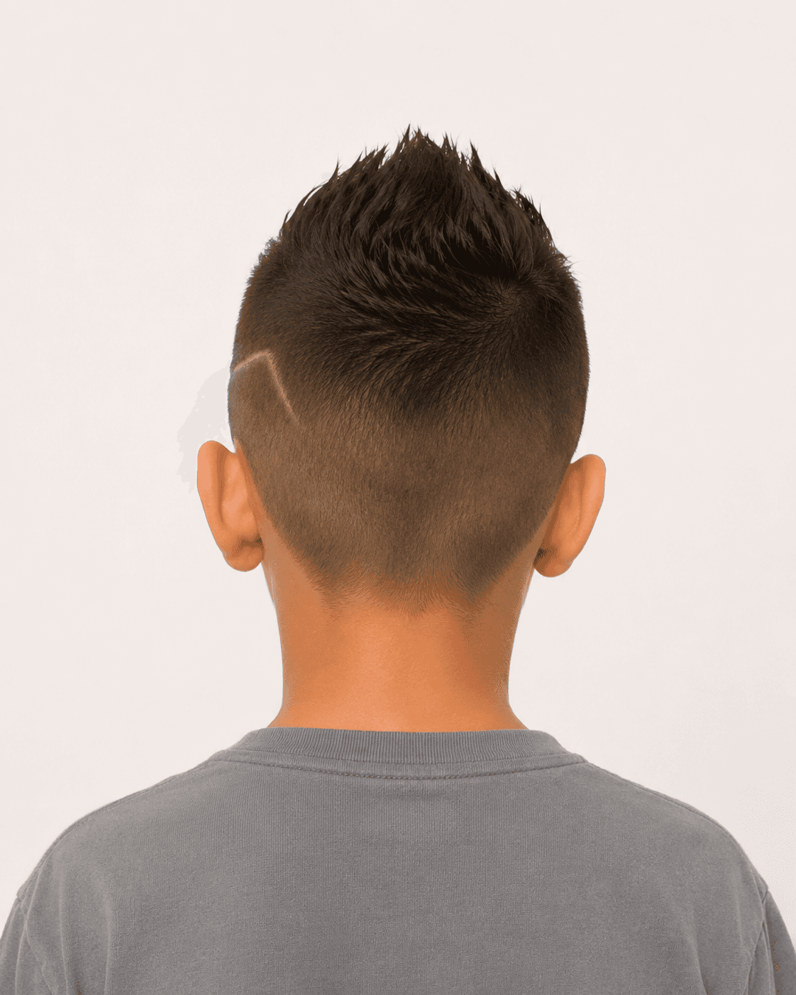 Rear view of a child-safe faux hawk reference showing the central rear ridge, shorter rear field, and soft nape transition