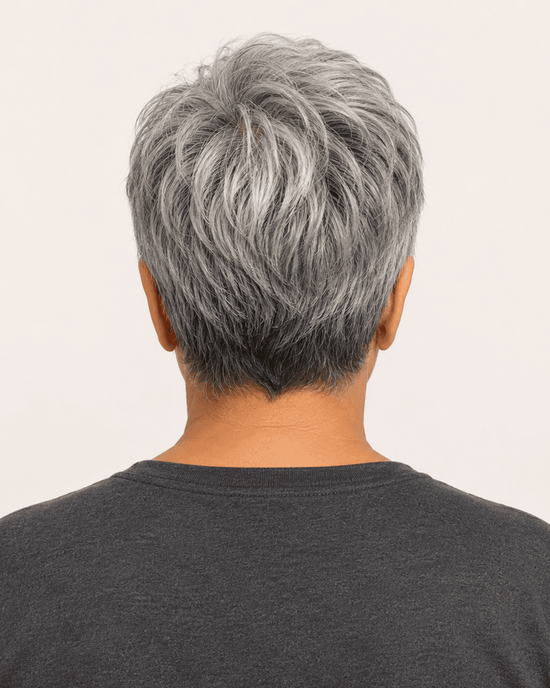 Annotated rear construction map for Cropped Pixie with Soft Fringe. Rear view of a compact pixie showing textured crown and central nape point